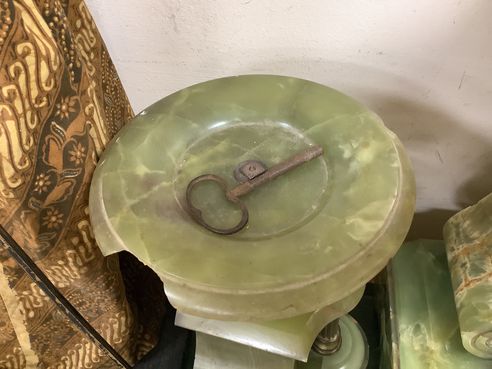 A gilt metal and onyx mantel clock garniture, height 47cm